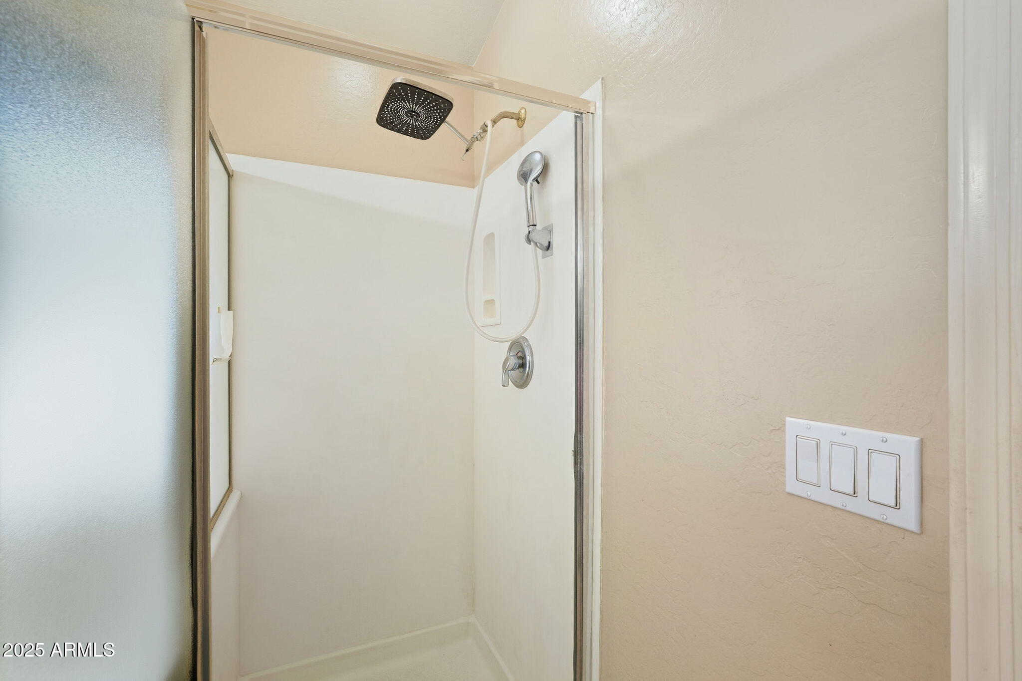 17509 West Rock Ledge Road Goodyear, AZ 85338 - Photo 36 of 55 a bathroom with a shower