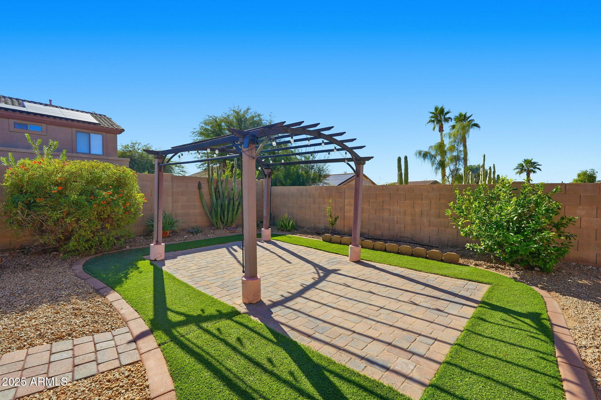 17509 West Rock Ledge Road Goodyear, AZ 85338 - Photo 43 of 55 a view of a balcony with two chairs and a table
