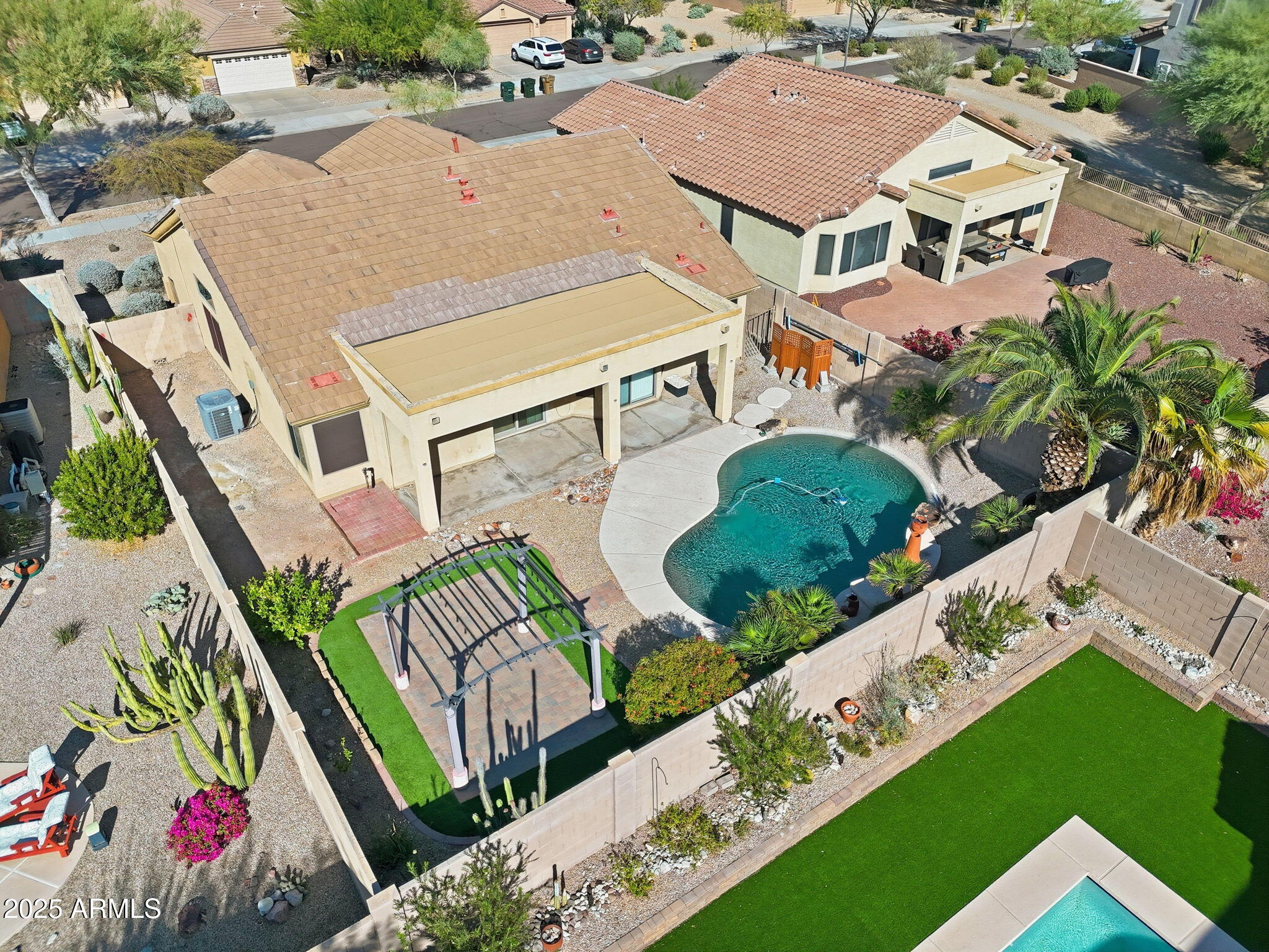 17509 West Rock Ledge Road Goodyear, AZ 85338 - Photo 49 of 55 an aerial view of a house with outdoor space and street view
