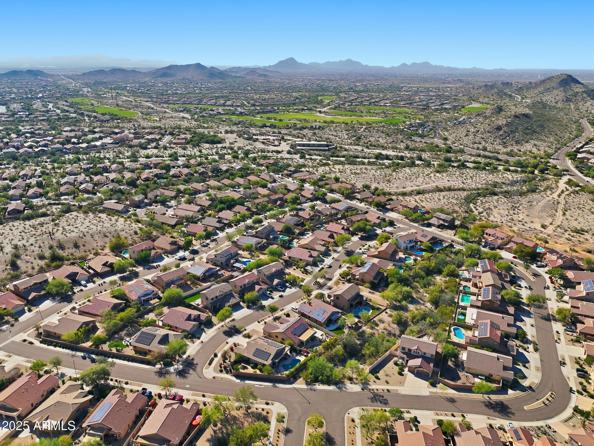 17509 West Rock Ledge Road Goodyear, AZ 85338 - Photo 51 of 55 an aerial view of residential houses with outdoor space