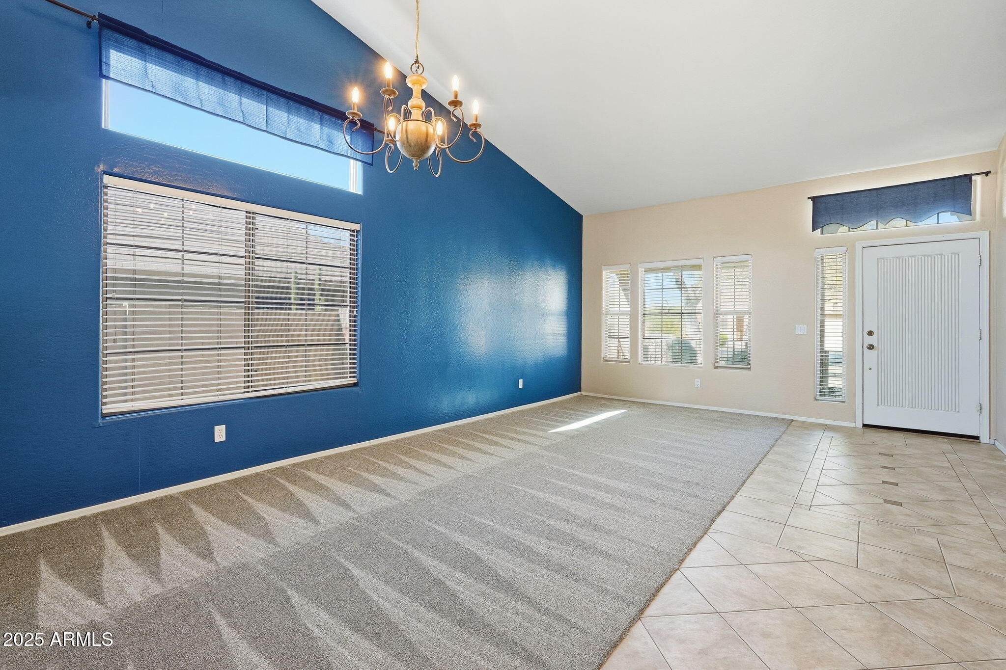 17509 West Rock Ledge Road Goodyear, AZ 85338 - Photo 8 of 55 a view of an empty room with a window