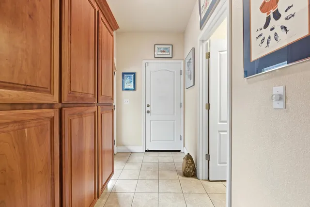 a bathroom with a sink and mirror with toilet