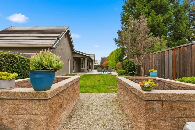 a view of a swimming pool with lounge chair