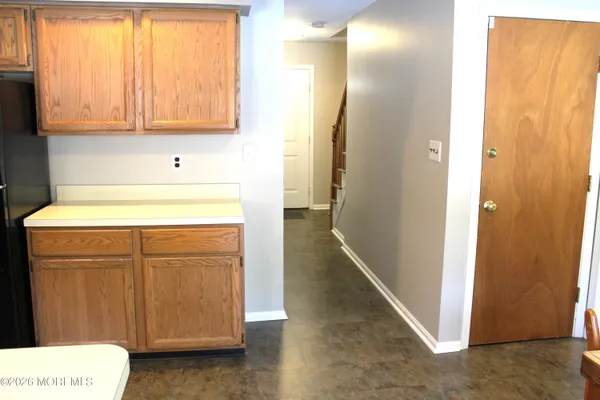 a bathroom with a shower and a toilet