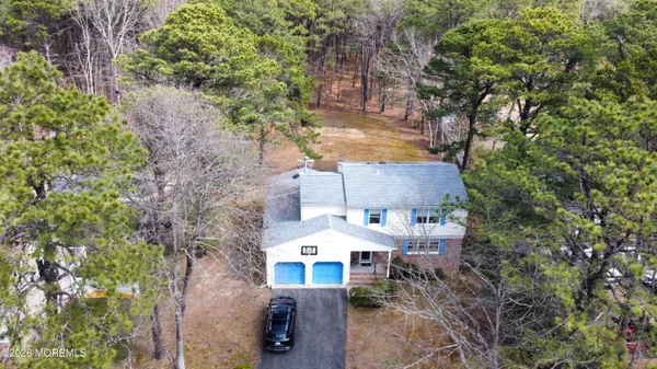a workspace with furniture and window