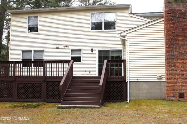 a kitchen with stainless steel appliances a stove a microwave and a refrigerator