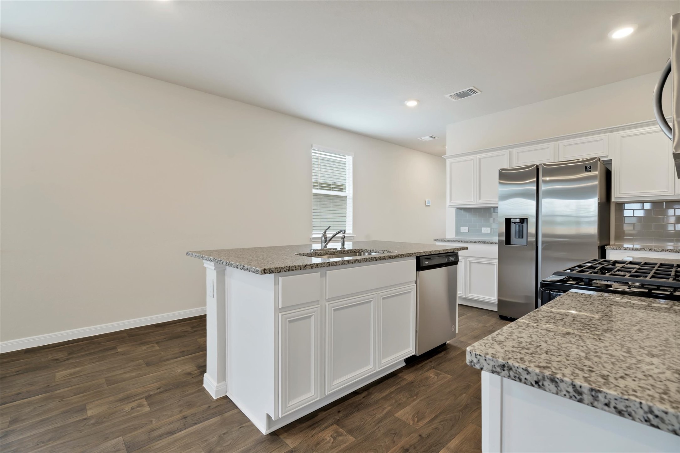 2909 Tweedy Trail Pflugerville, TX 78660 - Photo 19 of 27 A well-appointed kitchen island with ample counter space anchors this culinary haven.