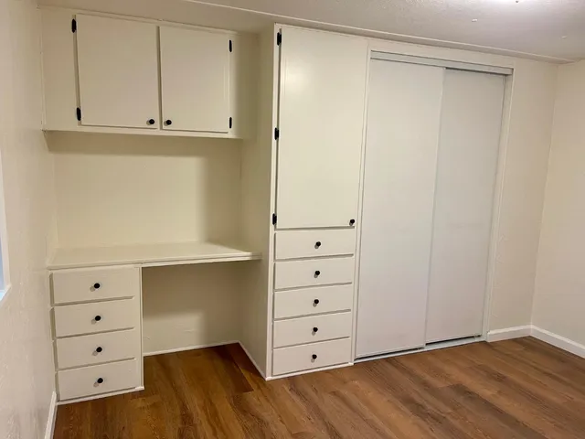 a view of an empty walk in closet