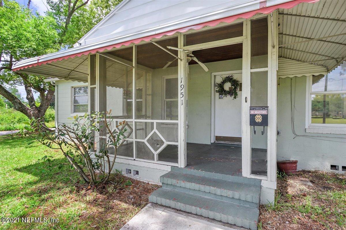 1951 Huntsford Road Jacksonville, FL 32207 - Photo 1 of 17 a front view of a house with a porch