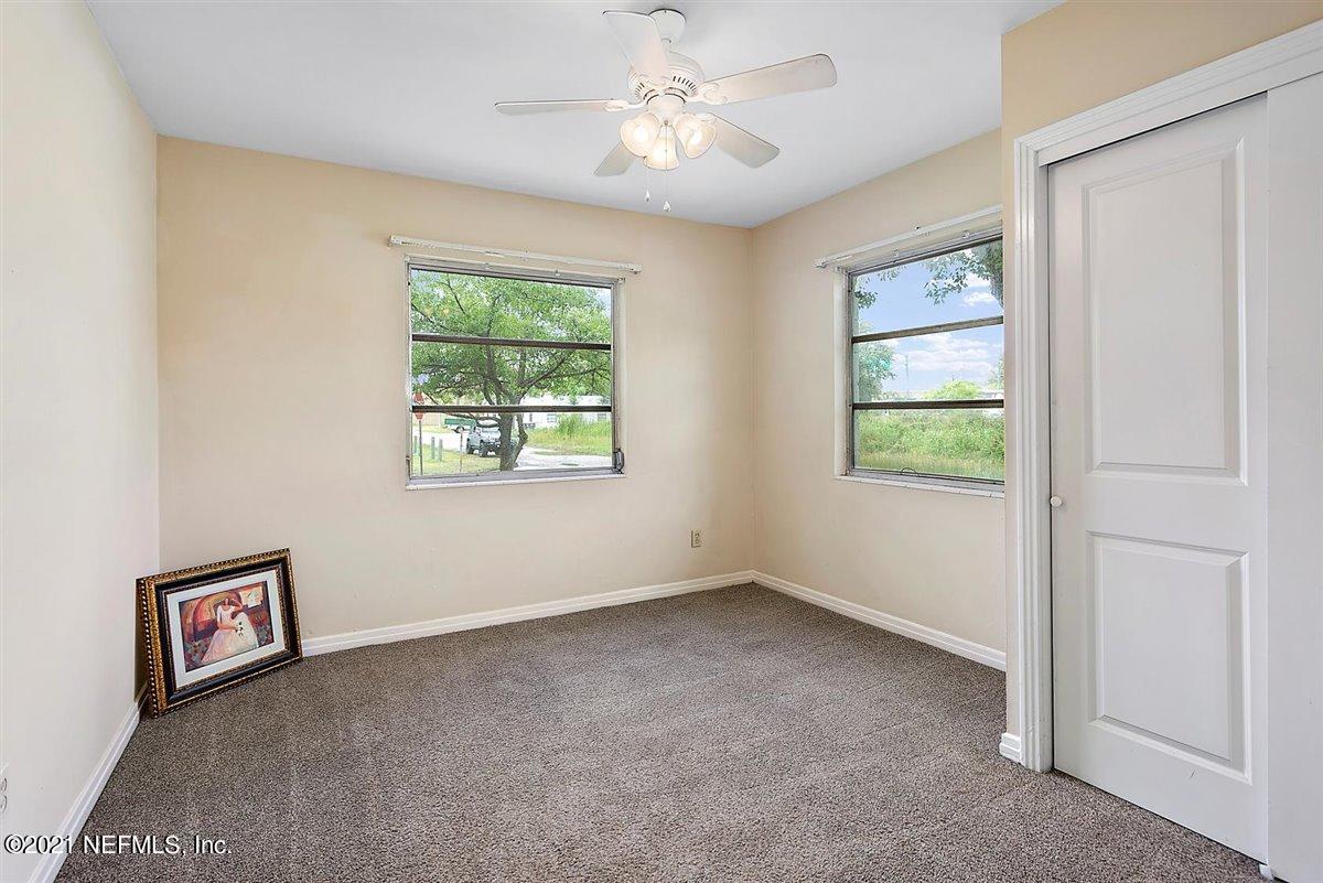 1951 Huntsford Road Jacksonville, FL 32207 - Photo 13 of 17 a view of an empty room with a window