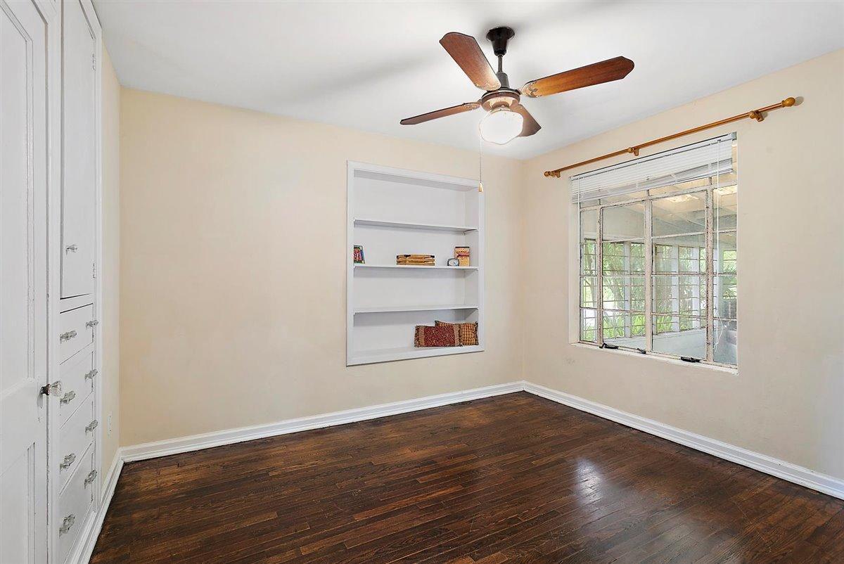 1951 Huntsford Road Jacksonville, FL 32207 - Photo 9 of 17 a view of a livingroom with a ceiling fan and wooden floor