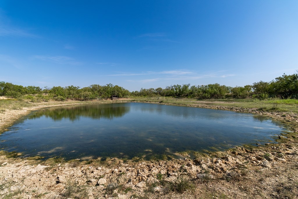 2280 County Road 4606 Paint Rock, TX 76866 - Photo 38 of 55 a view of a lake with a city