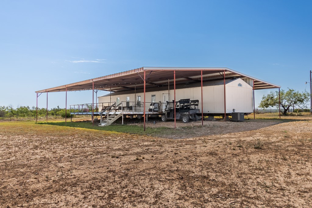 2280 County Road 4606 Paint Rock, TX 76866 - Photo 45 of 55 a view of a house with backyard and sitting area