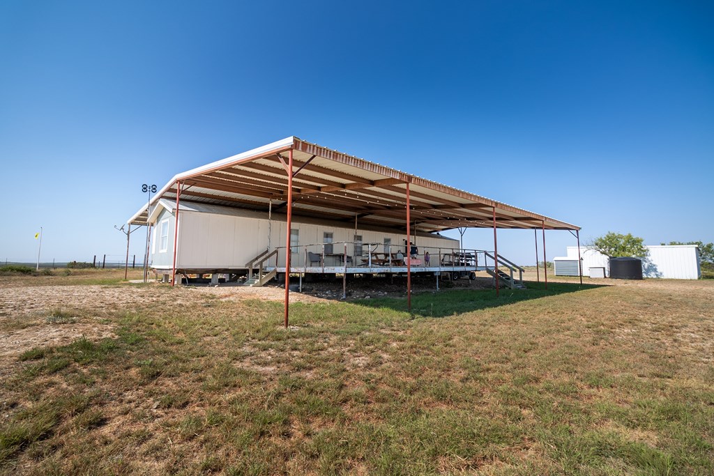 2280 County Road 4606 Paint Rock, TX 76866 - Photo 46 of 55 a view of a house with a yard