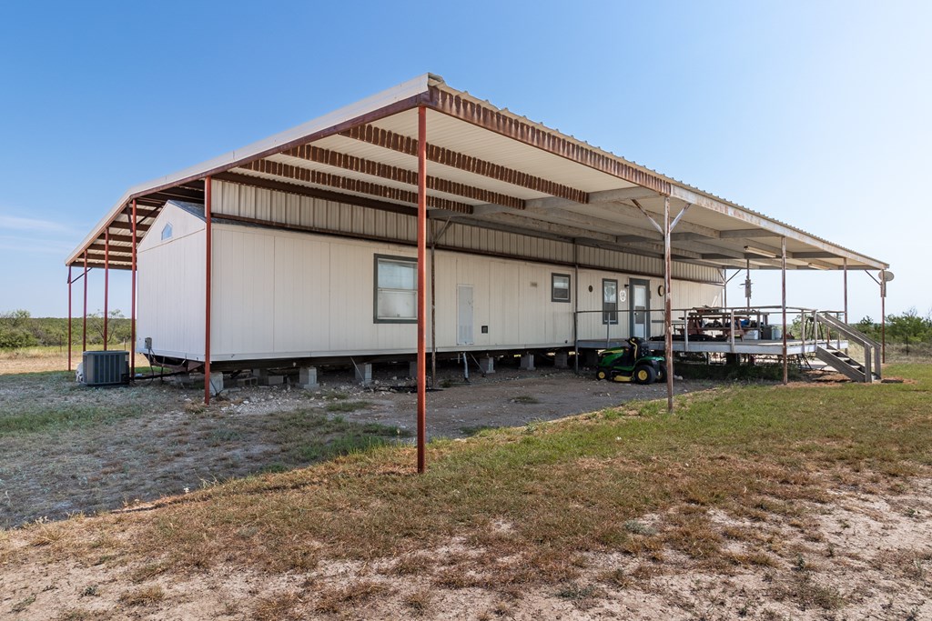 2280 County Road 4606 Paint Rock, TX 76866 - Photo 51 of 55 a view of a house with a backyard