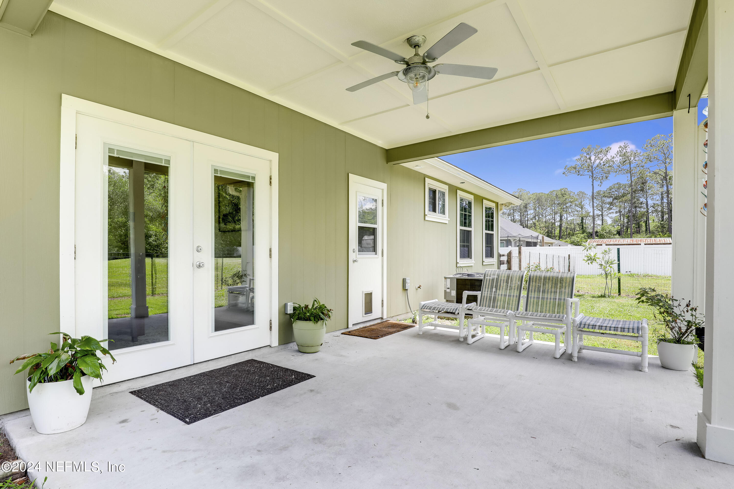 540685 Lem Turner Road Callahan, FL 32011 - Photo 34 of 58 a view of a porch with a garden
