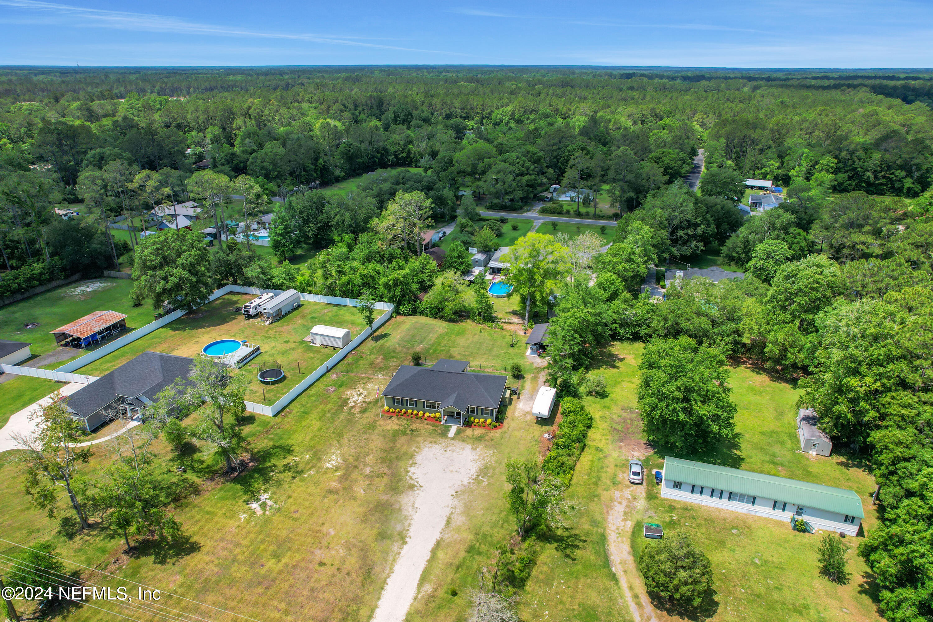 540685 Lem Turner Road Callahan, FL 32011 - Photo 54 of 58 an aerial view of a house with a yard