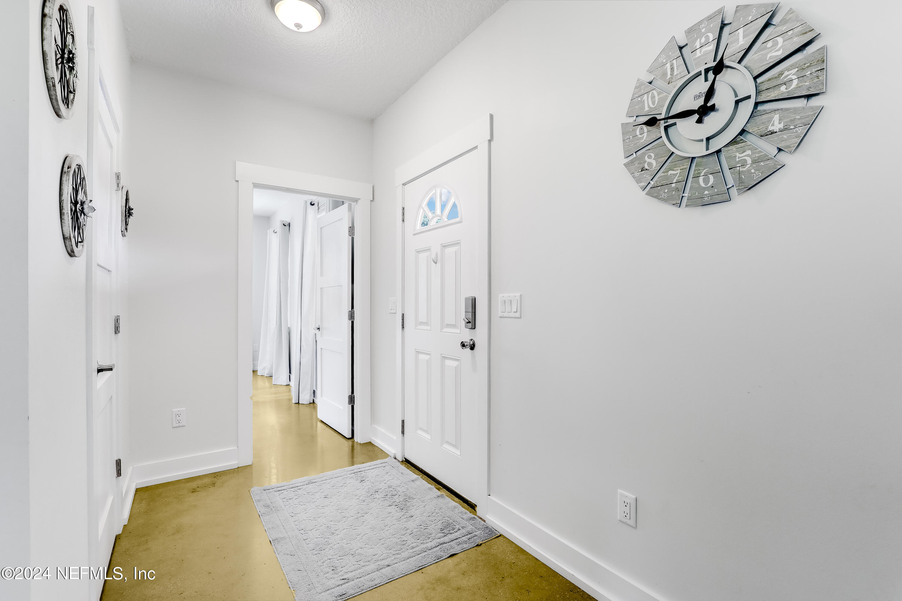 540685 Lem Turner Road Callahan, FL 32011 - Photo 10 of 58 a view of room with hallway and wooden floor