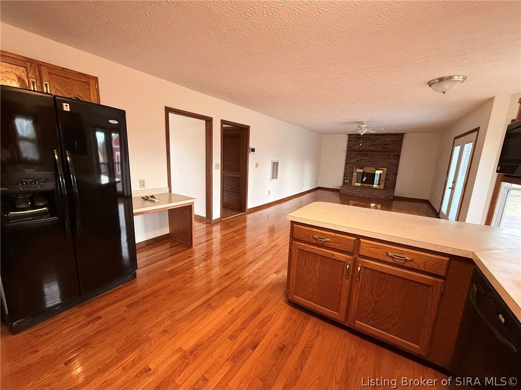 1635 West Monique Drive Scottsburg, IN 47170 - Photo 13 of 35 Kitchen and family room
