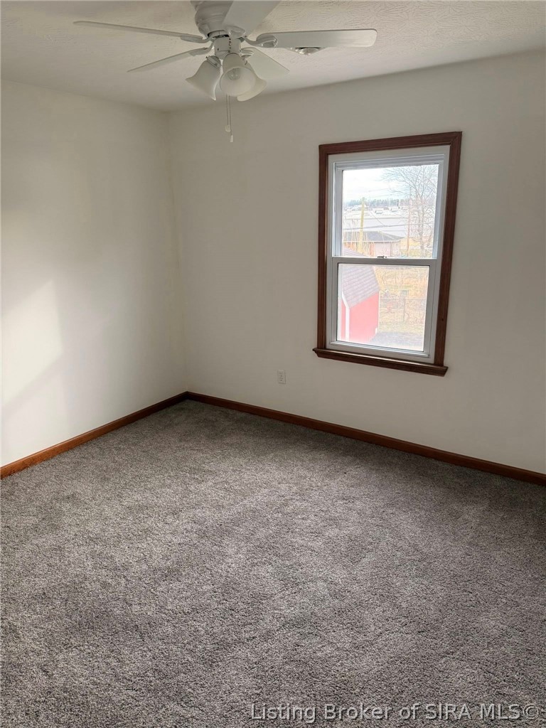 1635 West Monique Drive Scottsburg, IN 47170 - Photo 21 of 35 Back bedroom upstairs
#3 of 4