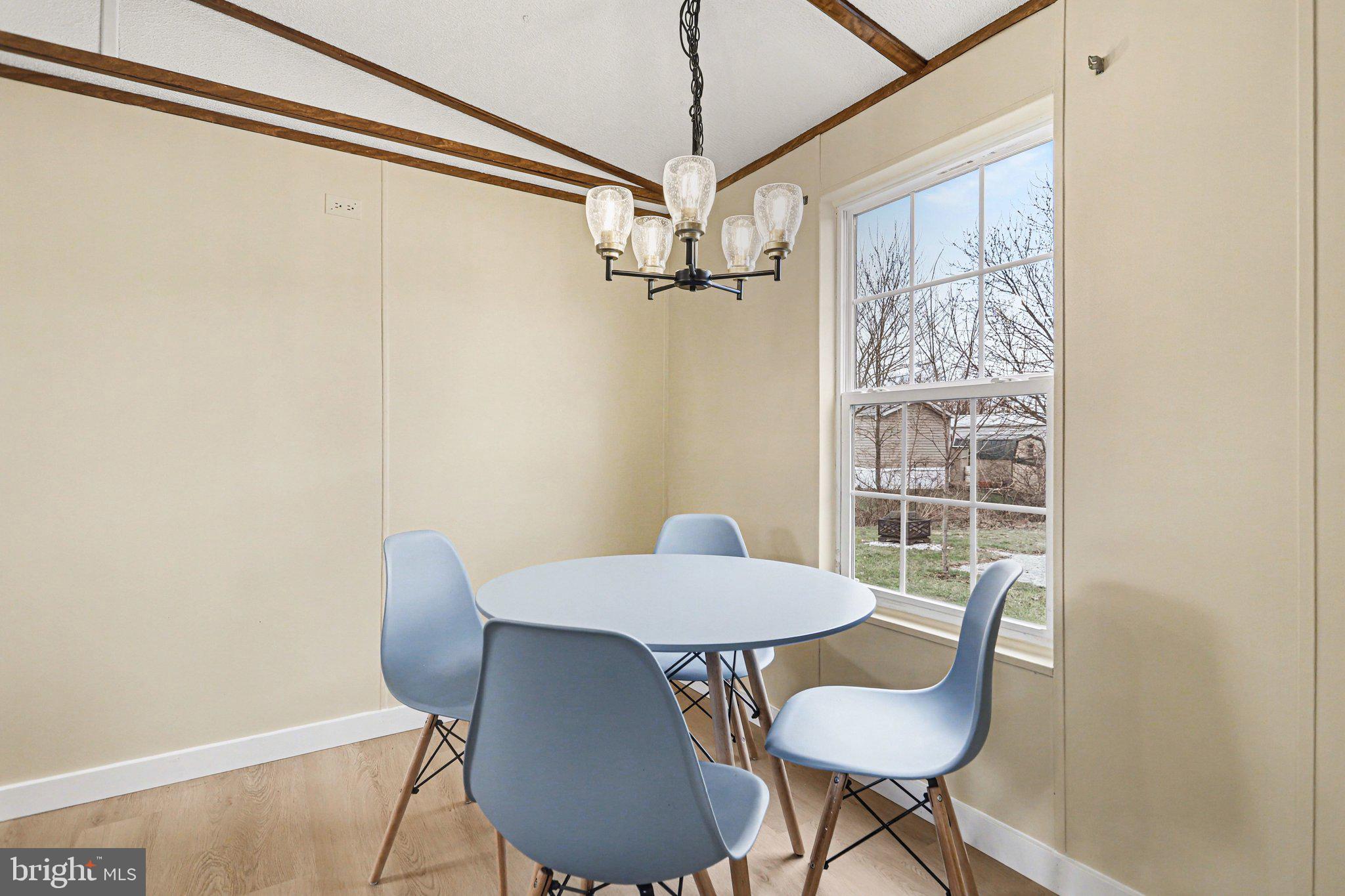 31 Davis Avenue Gettysburg, PA 17325 - Photo 8 of 27 a view of a dining room with furniture window and wooden floor