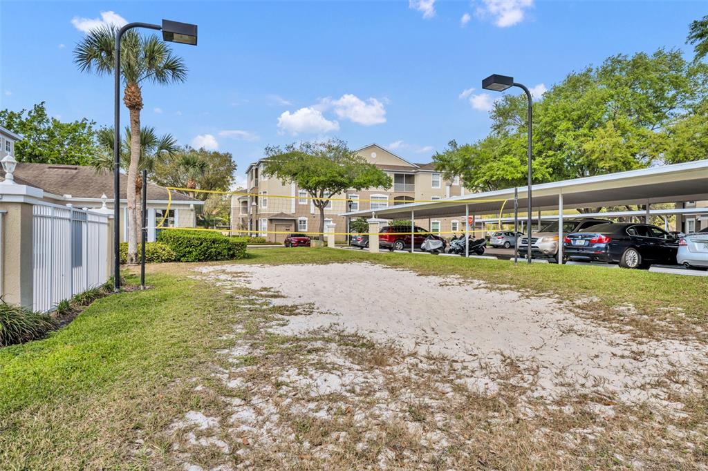 582 Brantley Terrace Way, Unit 304 Altamonte Springs, FL 32714 - Photo 30 of 30 a view of a house with a yard