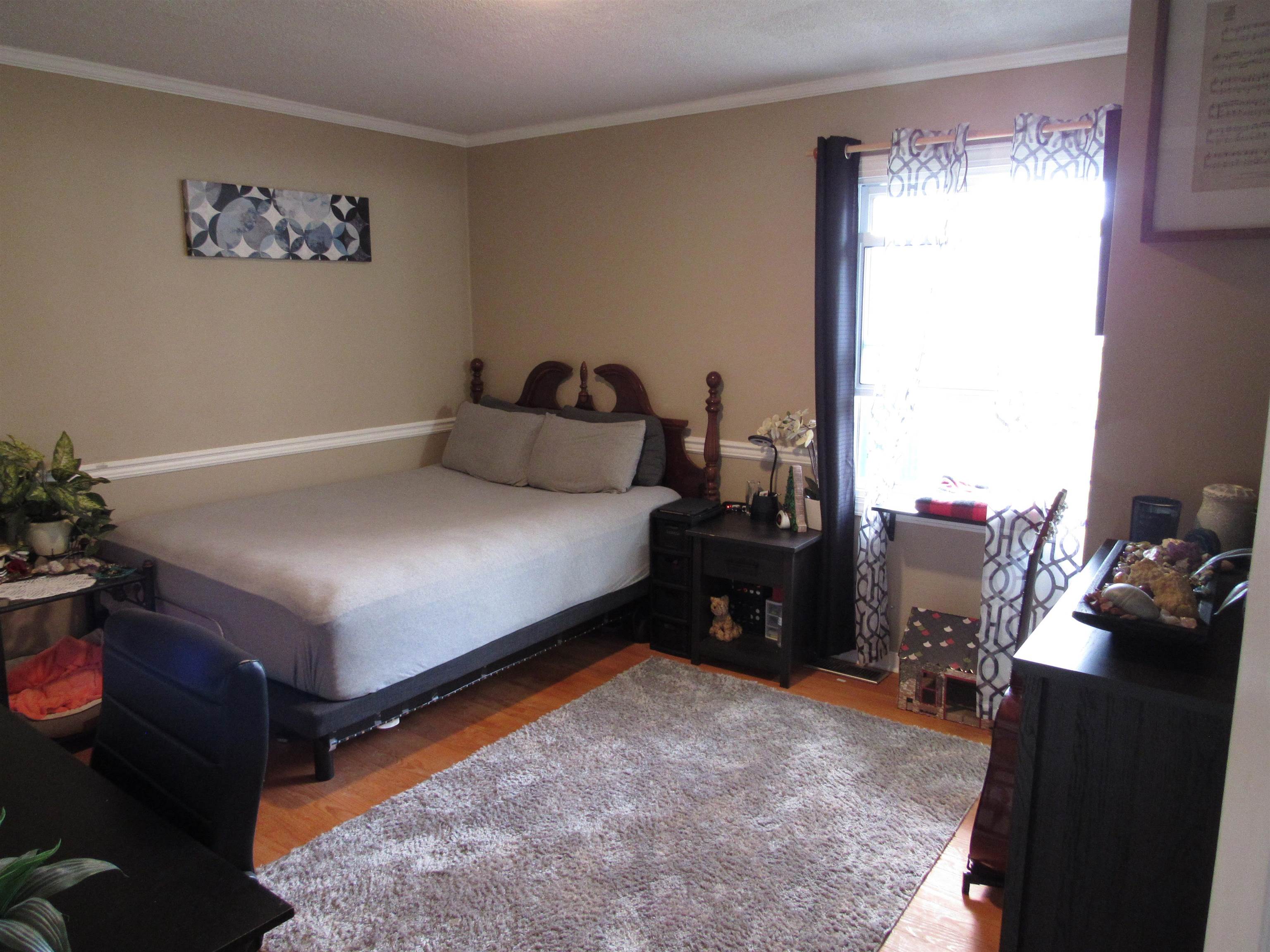 31 Stubblefield Road Waynesboro, VA 22980 - Photo 23 of 41 a bedroom with a bed and a window