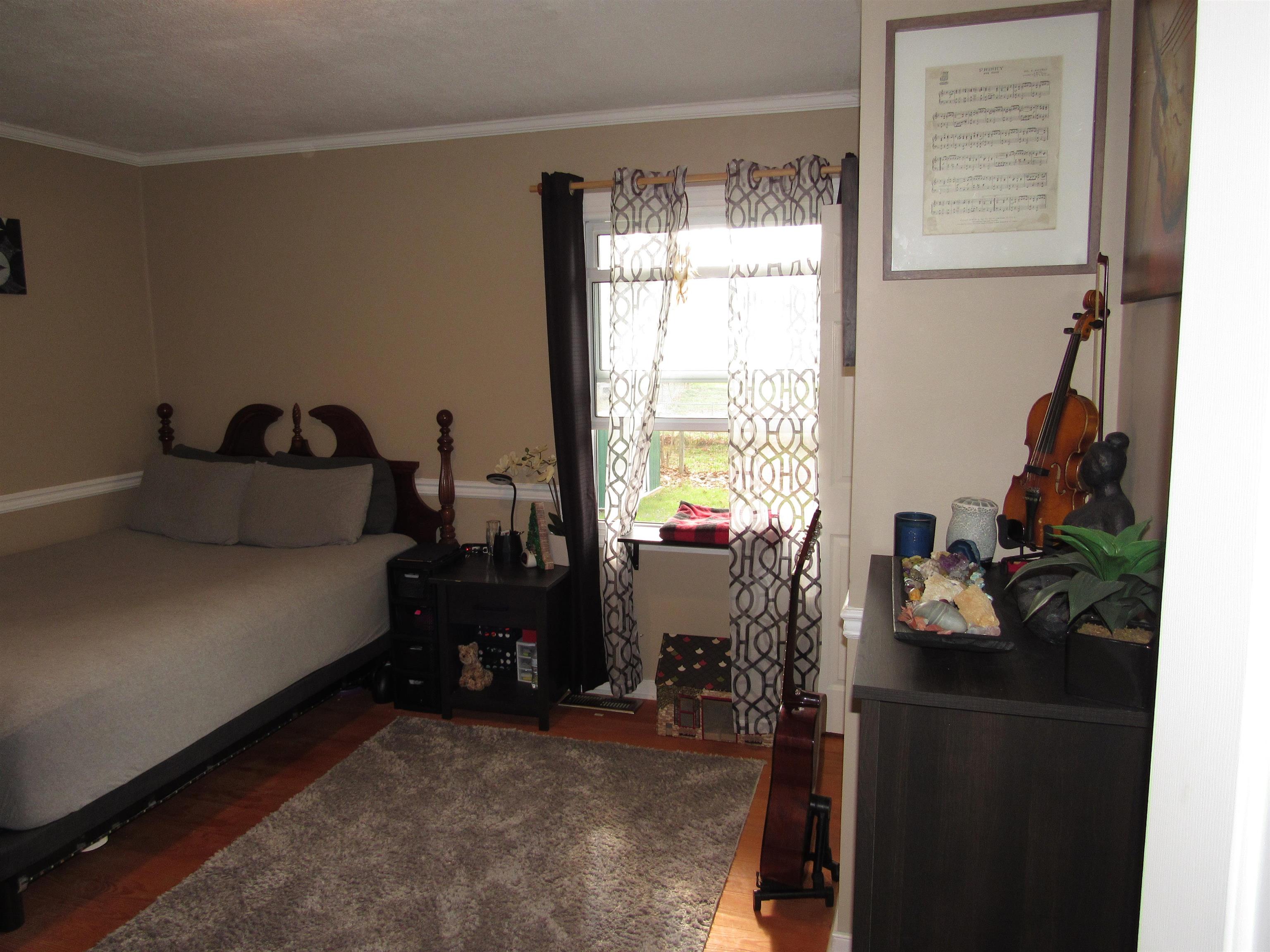 31 Stubblefield Road Waynesboro, VA 22980 - Photo 24 of 41 a bedroom with a bed and a window