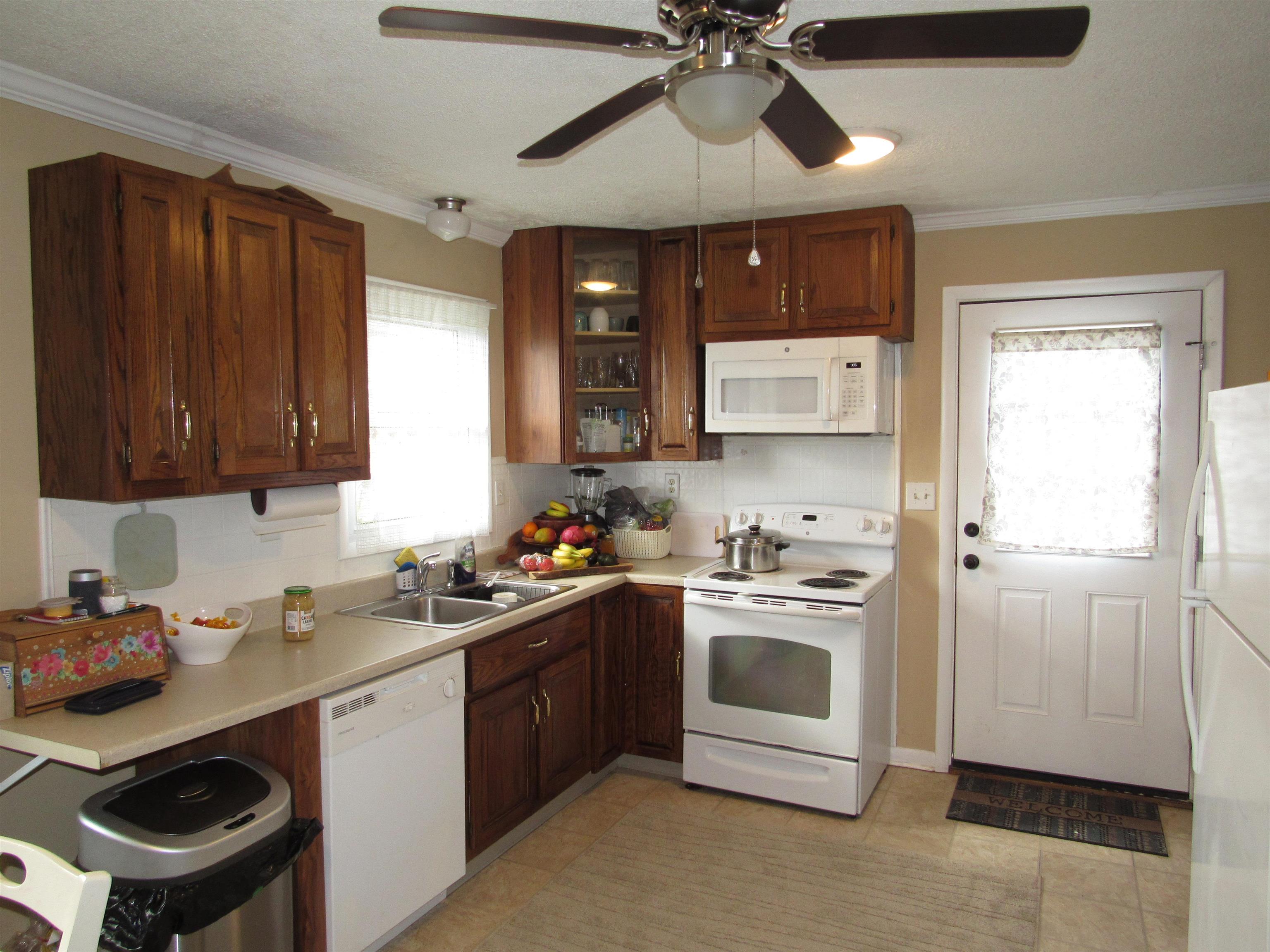 31 Stubblefield Road Waynesboro, VA 22980 - Photo 7 of 41 a kitchen with stainless steel appliances a sink a stove and cabinets