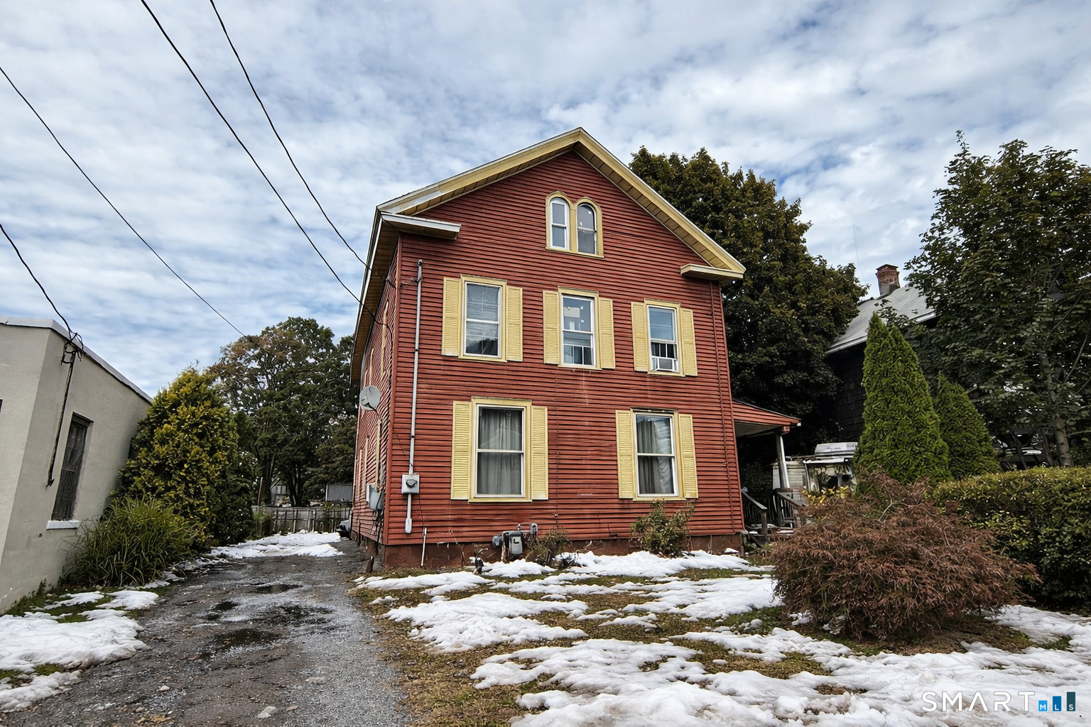 281 Hanover Street, Unit 2 Meriden, CT 06451 - Photo 1 of 2 a front view of a house with a yard