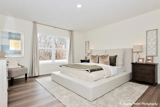 a bed room with a bed and a couch