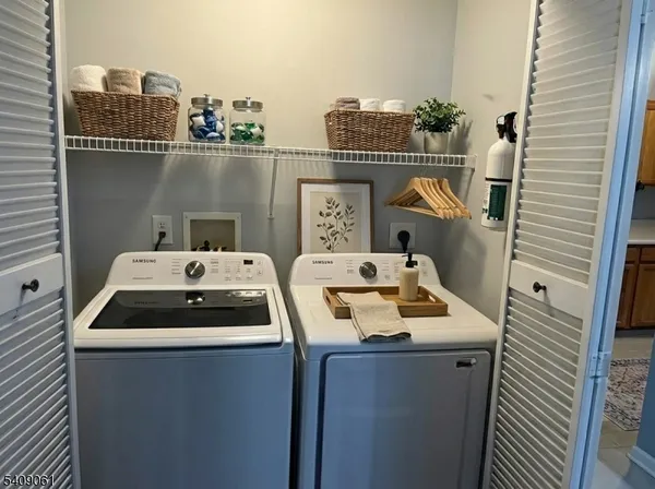 a utility room with washer and dryer