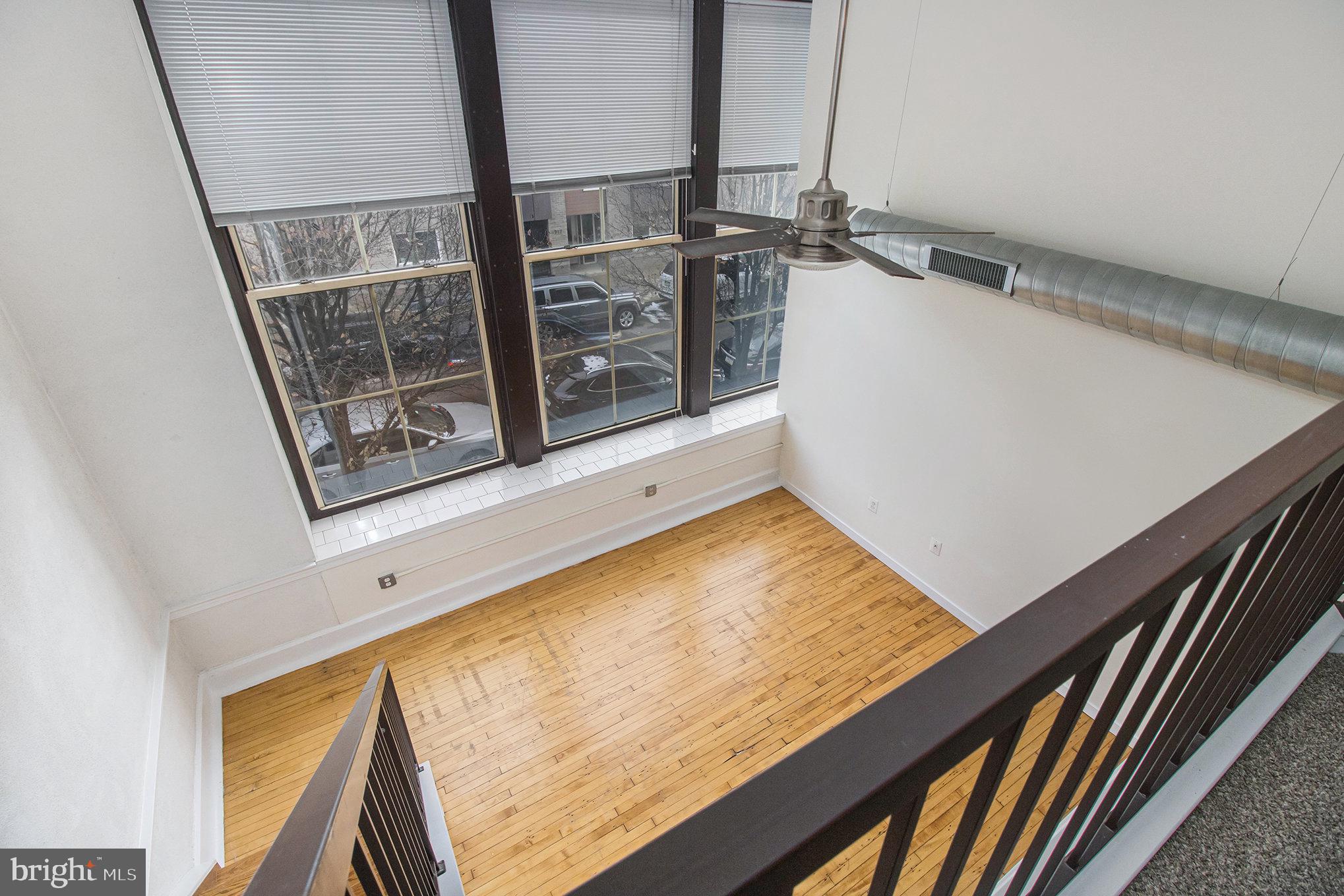 1201 Fitzwater Street, Unit 207 Philadelphia, PA 19147 - Photo 13 of 39 a view of a living room