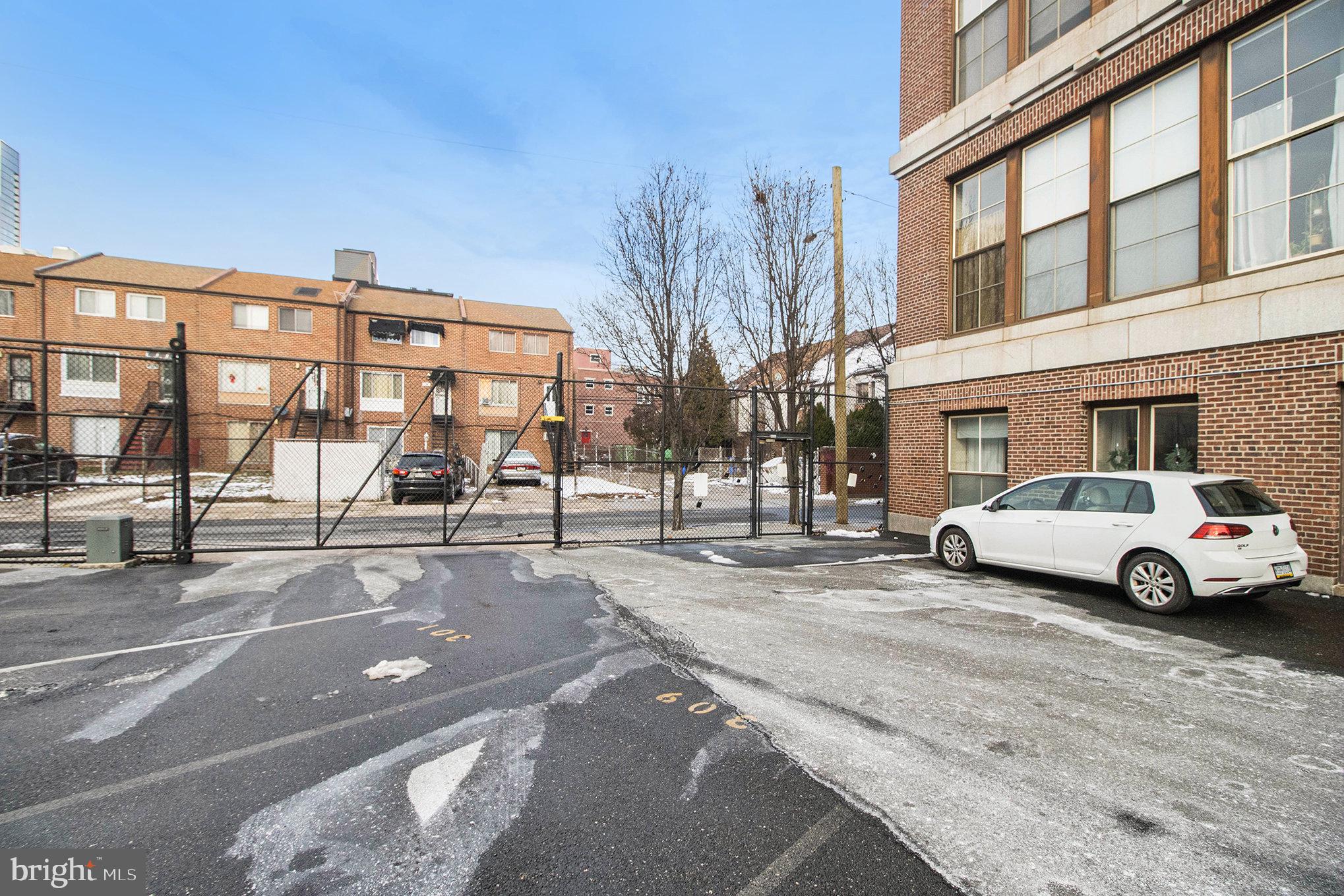 1201 Fitzwater Street, Unit 207 Philadelphia, PA 19147 - Photo 2 of 39 a view of building with parking area