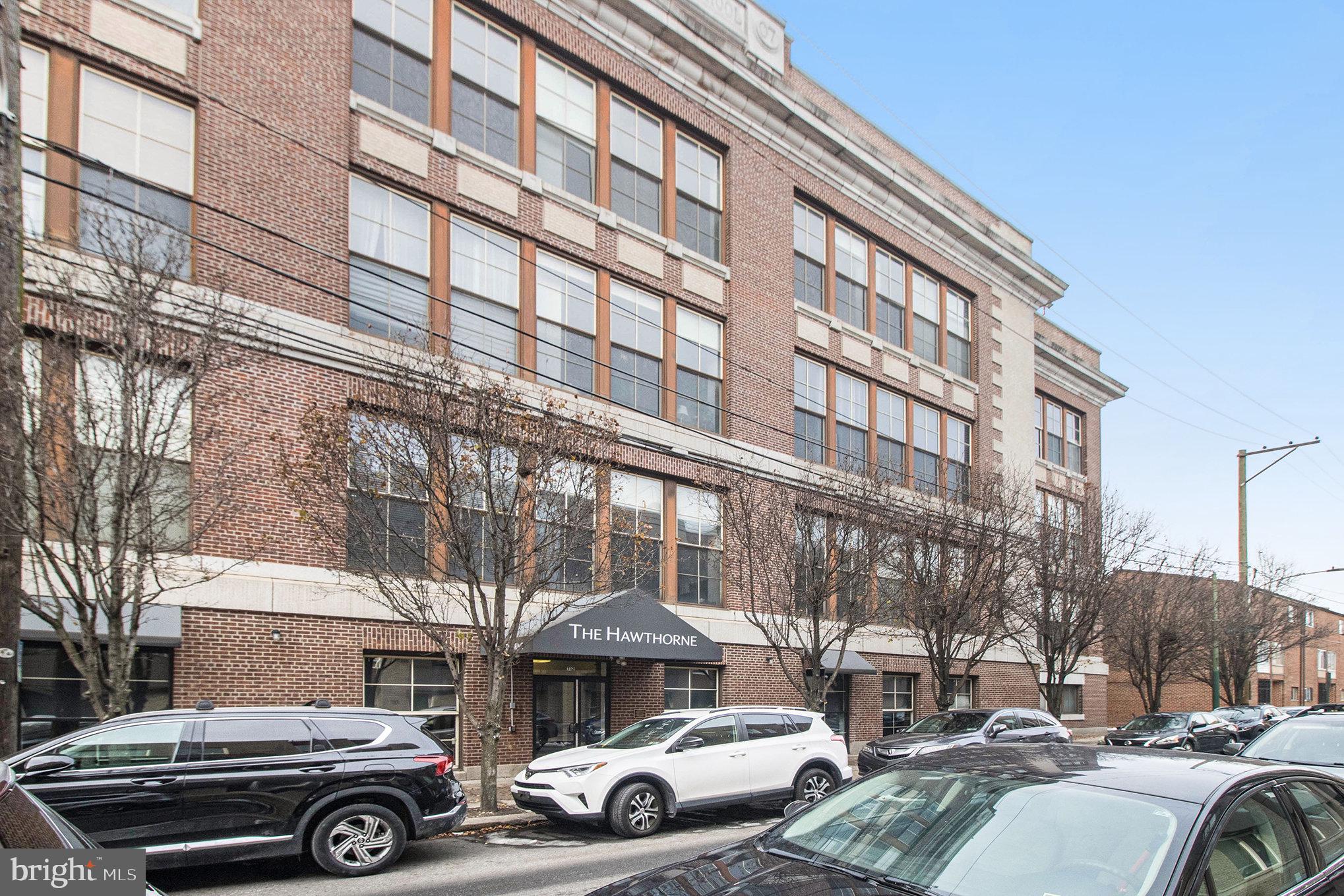 1201 Fitzwater Street, Unit 207 Philadelphia, PA 19147 - Photo 26 of 39 a car parked in front of a building