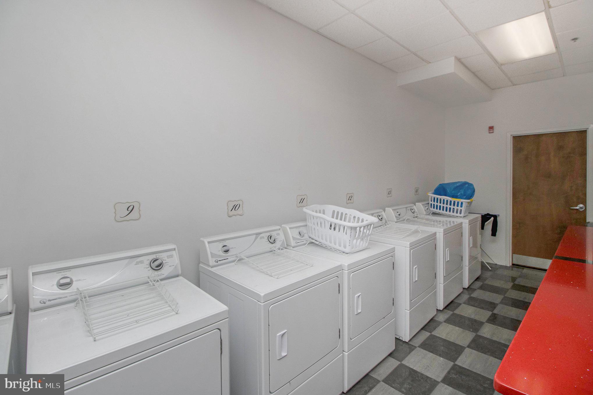 1201 Fitzwater Street, Unit 207 Philadelphia, PA 19147 - Photo 30 of 39 a utility room with dryer and washer