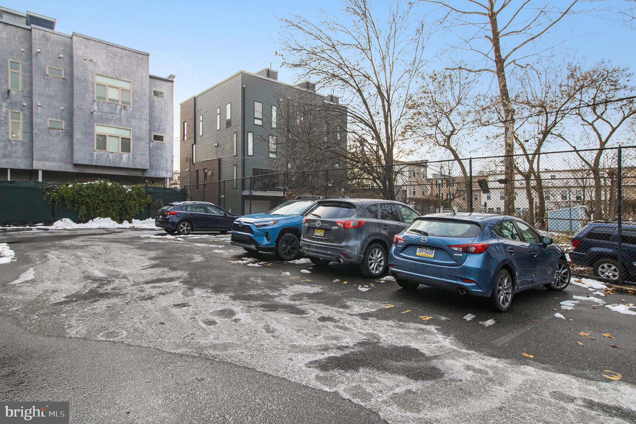 1201 Fitzwater Street, Unit 207 Philadelphia, PA 19147 - Photo 32 of 39 a cars parked on the side of a street