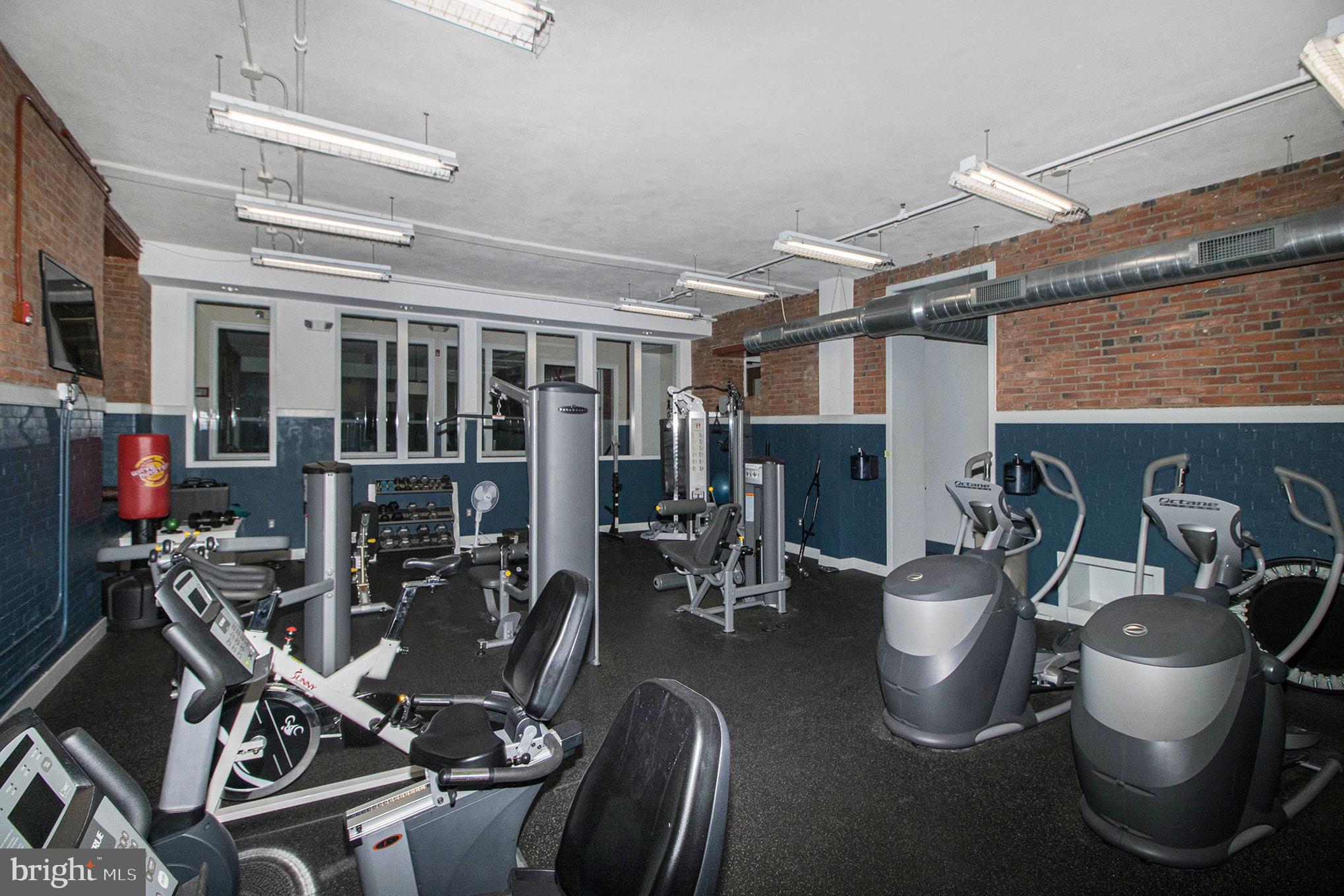 1201 Fitzwater Street, Unit 207 Philadelphia, PA 19147 - Photo 34 of 39 a view of a room with gym equipment