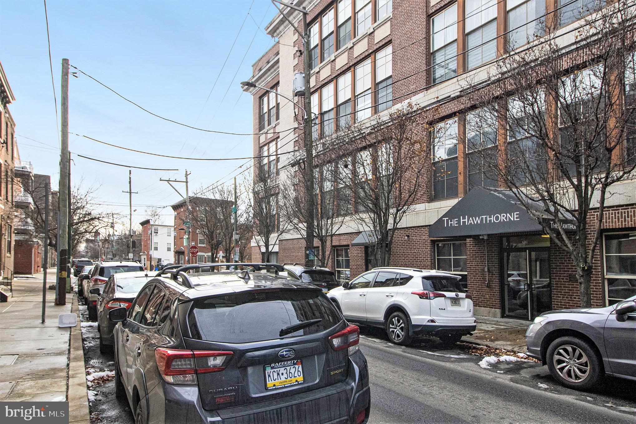 1201 Fitzwater Street, Unit 207 Philadelphia, PA 19147 - Photo 35 of 39 a view of outdoor space with parked cars