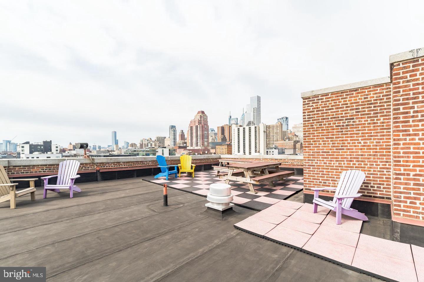 1201 Fitzwater Street, Unit 207 Philadelphia, PA 19147 - Photo 5 of 39 a view of a terrace with sitting area