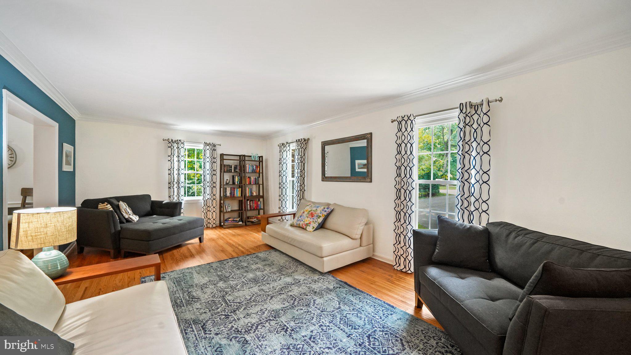 2 James Thomas Road Malvern, PA 19355 - Photo 12 of 40 Bright living room with 3 large windows