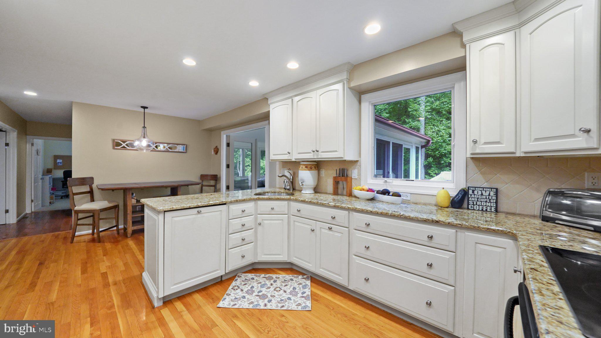 2 James Thomas Road Malvern, PA 19355 - Photo 16 of 40 Kitchen with white cabinets and breakfast room