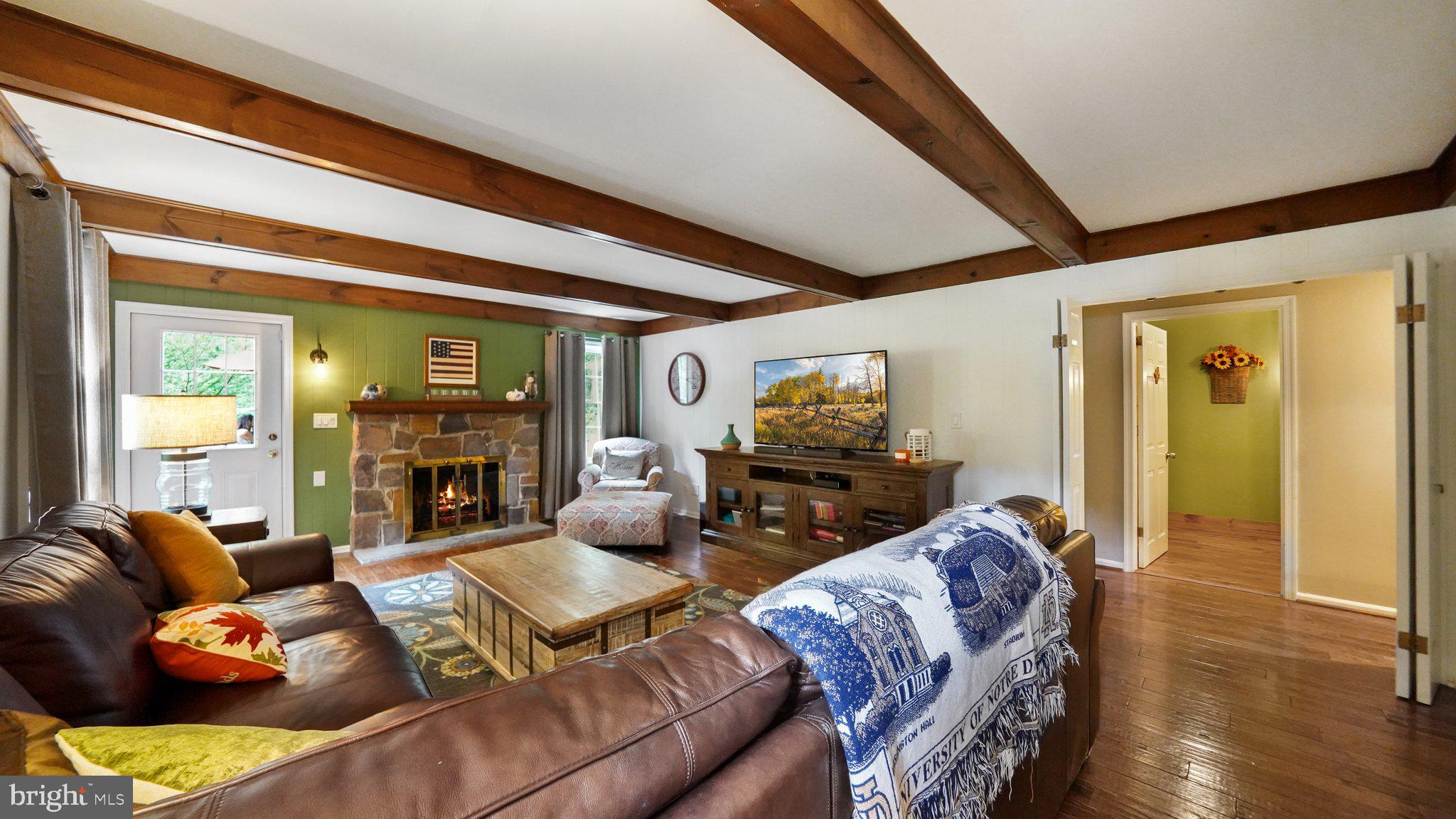 2 James Thomas Road Malvern, PA 19355 - Photo 21 of 40 Large family room with exposed beams