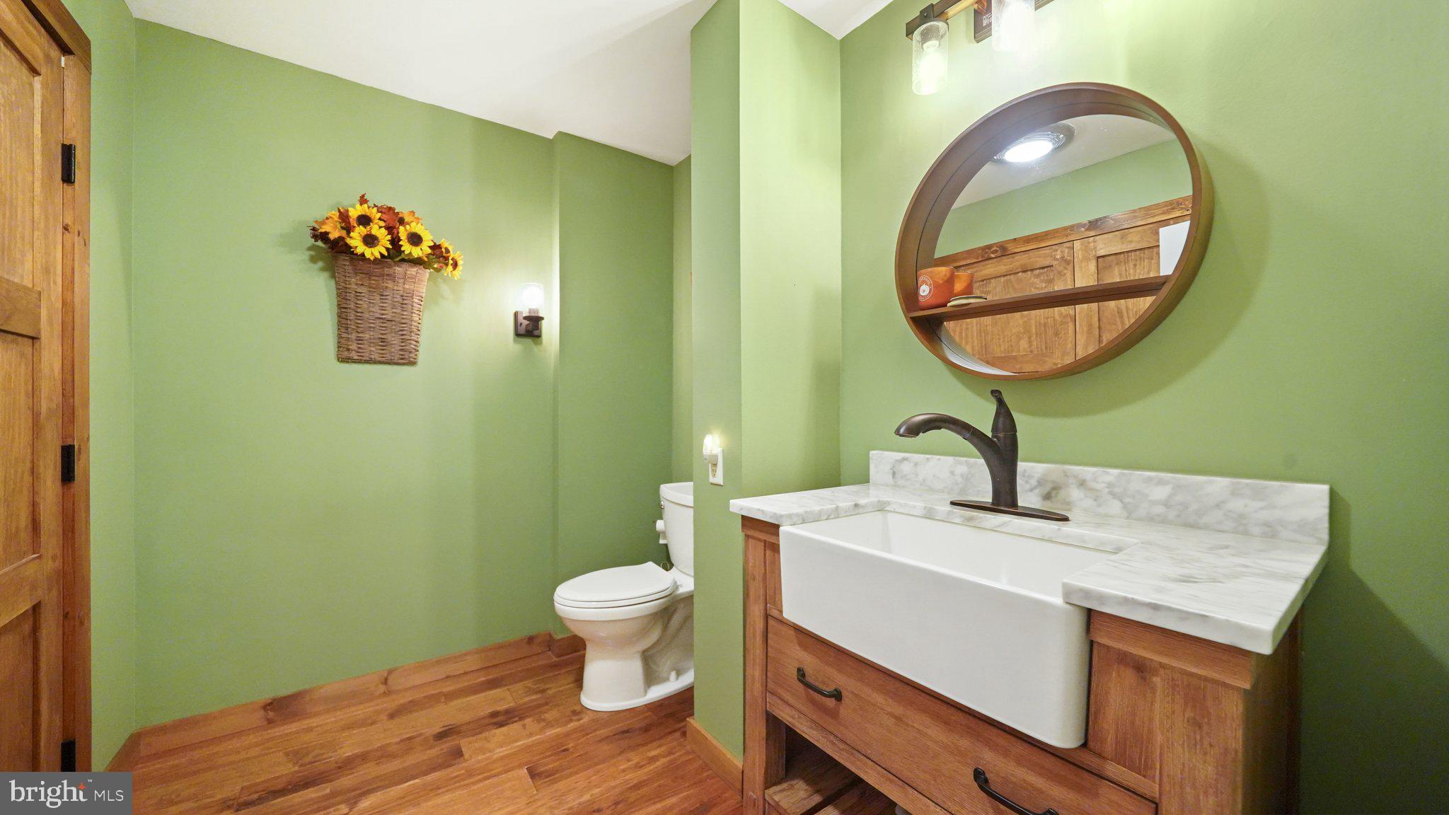 2 James Thomas Road Malvern, PA 19355 - Photo 23 of 40 Updated powder room with wood floor