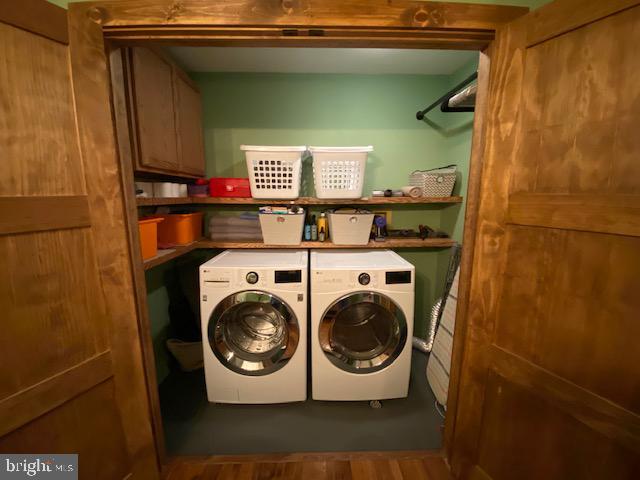 2 James Thomas Road Malvern, PA 19355 - Photo 24 of 40 Laundry room in half bath behind wood doors