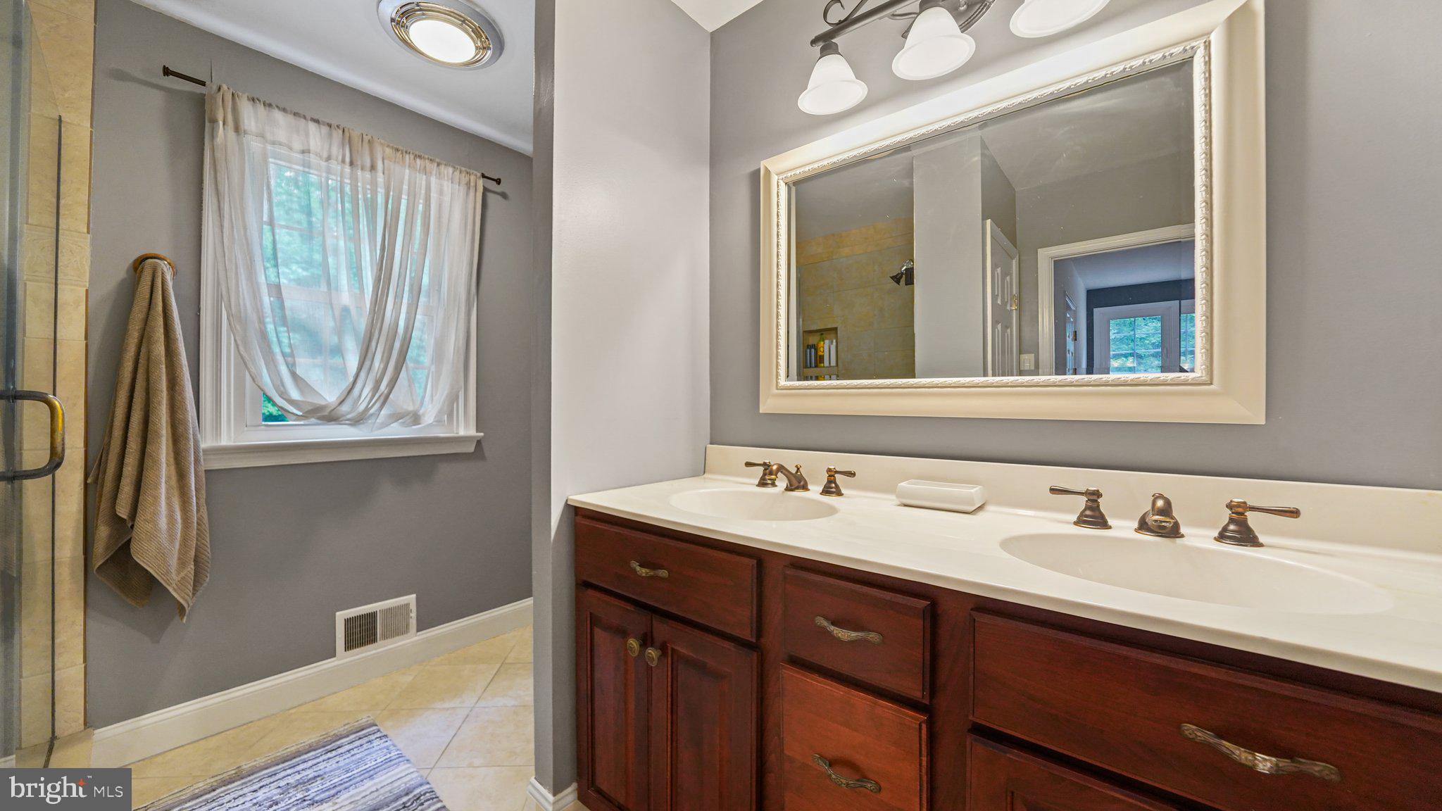 2 James Thomas Road Malvern, PA 19355 - Photo 28 of 40 Main bathroom has been updated with double sinks