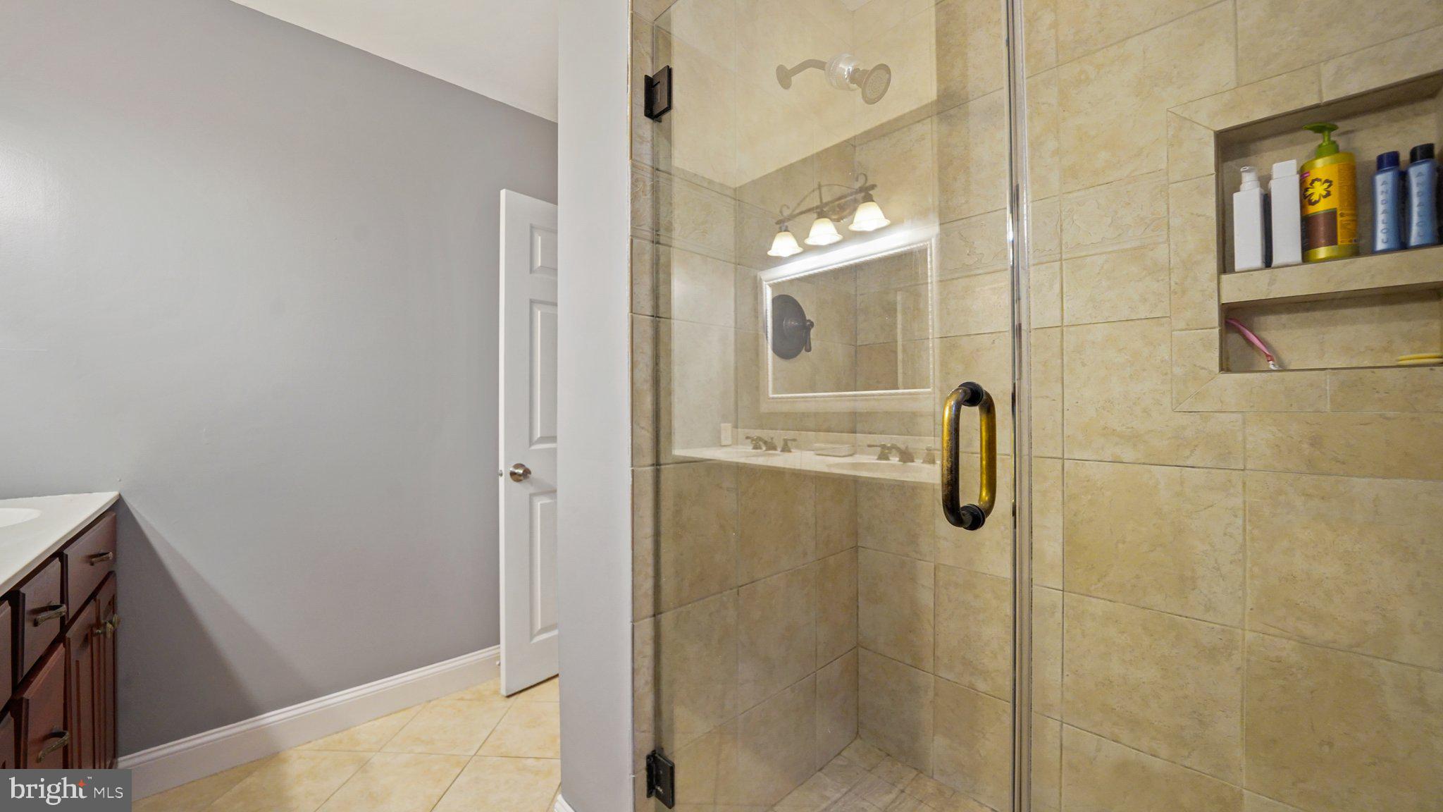 2 James Thomas Road Malvern, PA 19355 - Photo 29 of 40 Main bath with tile floor and tile shower