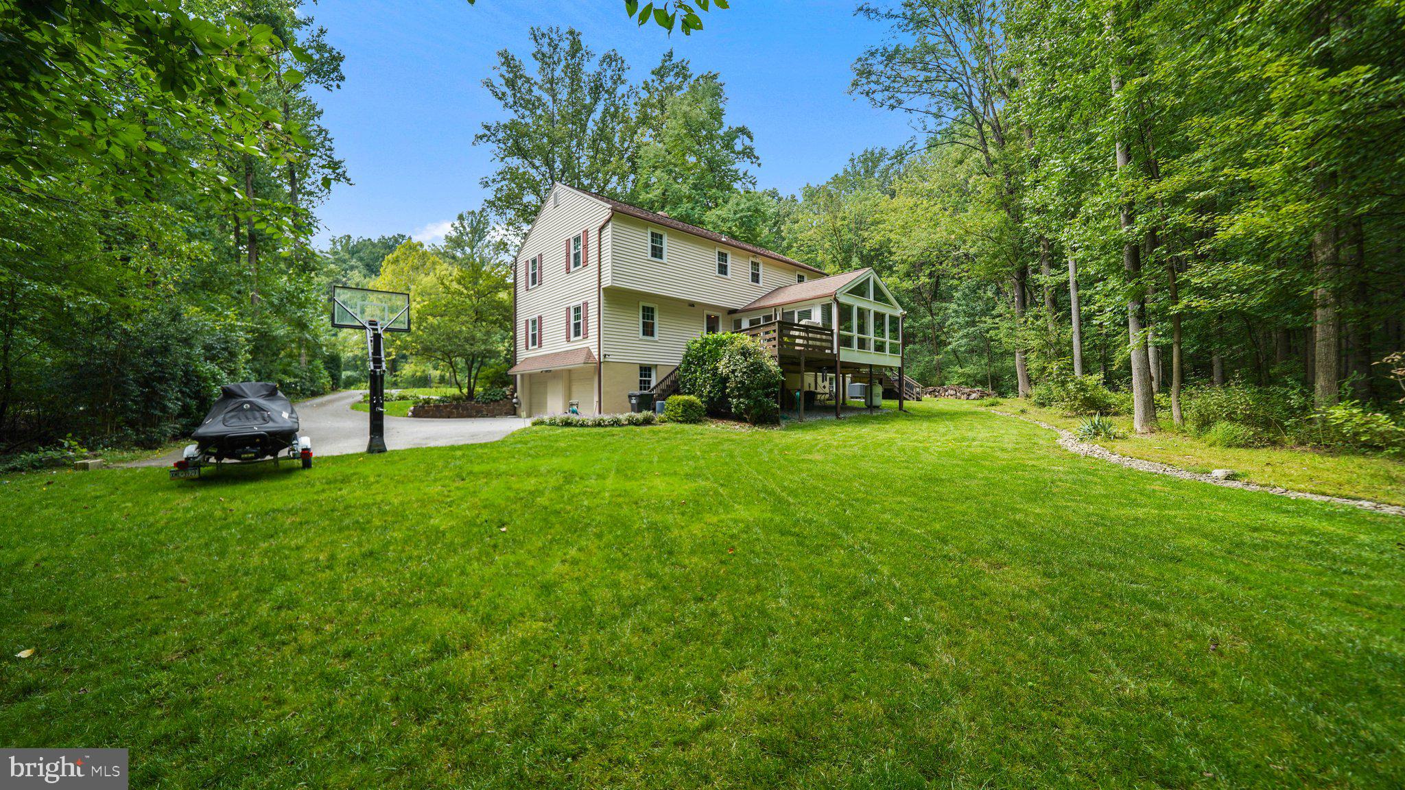 2 James Thomas Road Malvern, PA 19355 - Photo 8 of 40 Enjoy lawn areas as well as woods