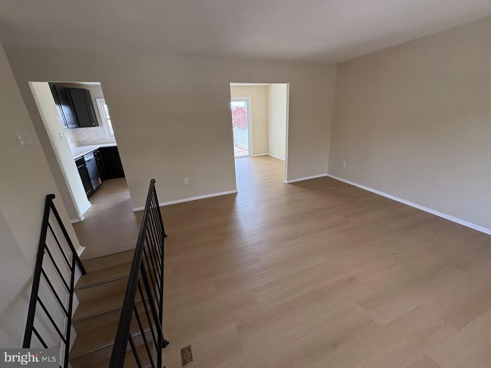7907 Chalice Road Severn, MD 21144 - Photo 15 of 34 a view of a livingroom with furniture and wooden floor