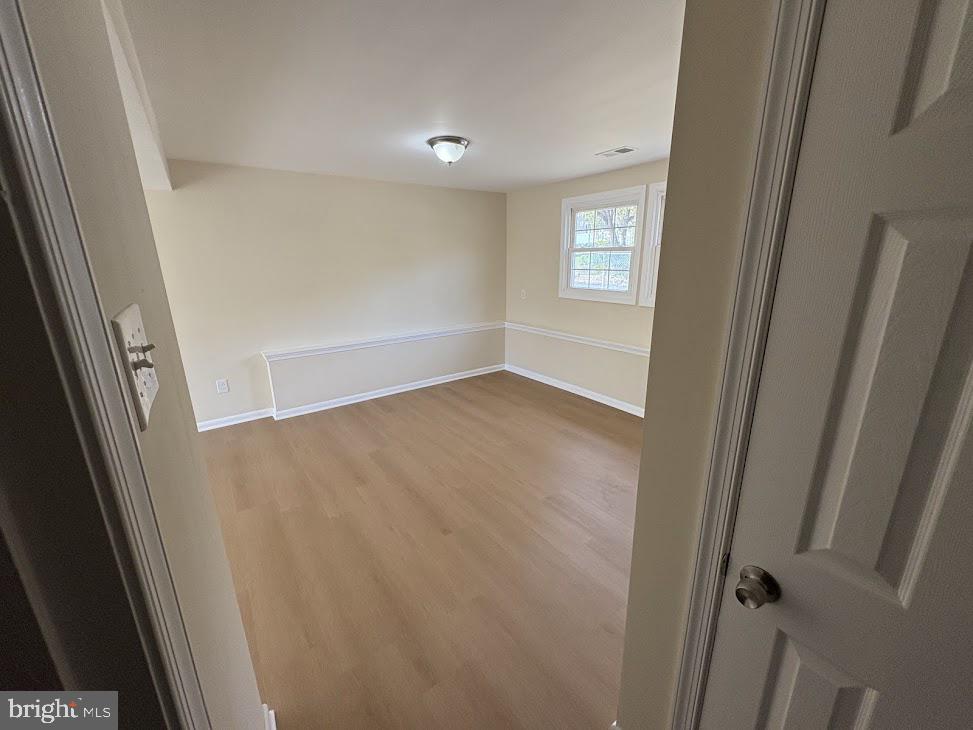 7907 Chalice Road Severn, MD 21144 - Photo 25 of 34 a view of an empty room